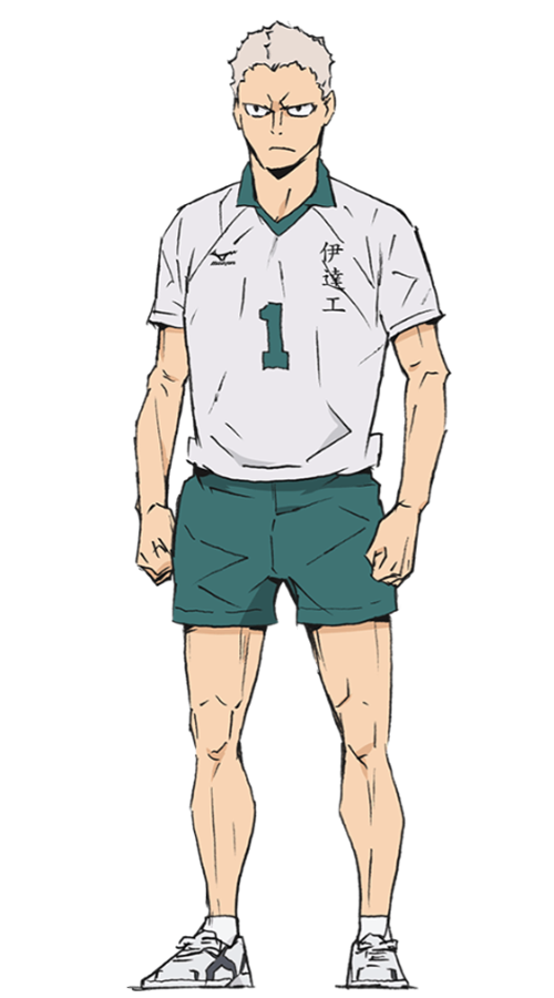 Aone Takanobu, con su uniforme principal del equipo de Dateko con el número 1, tiene los brazos a los costados con los puños cerrados, tiene el ceño fruncido y no usa rodilleras
